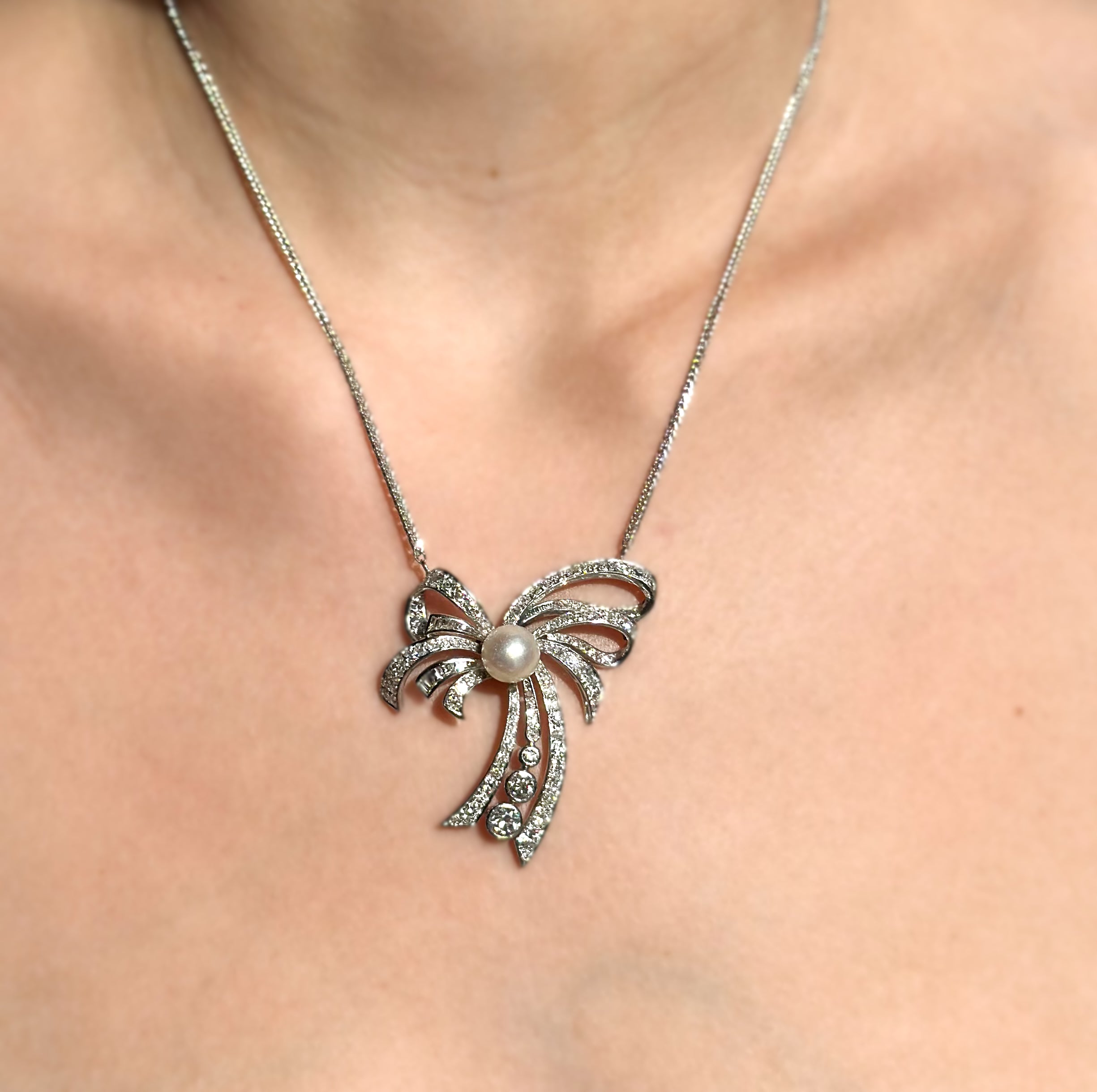Vintage diamond and pearl brooch necklace in 18K white gold